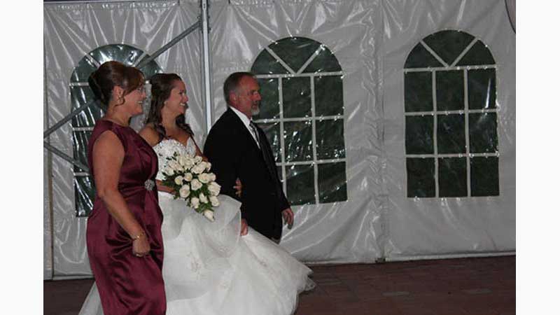From Wedding 5, Oshawa DJ, Bride entering for the ceremony with Mom and Dad on each side of her, Gorgeous. Taken in Oshawa Ontario